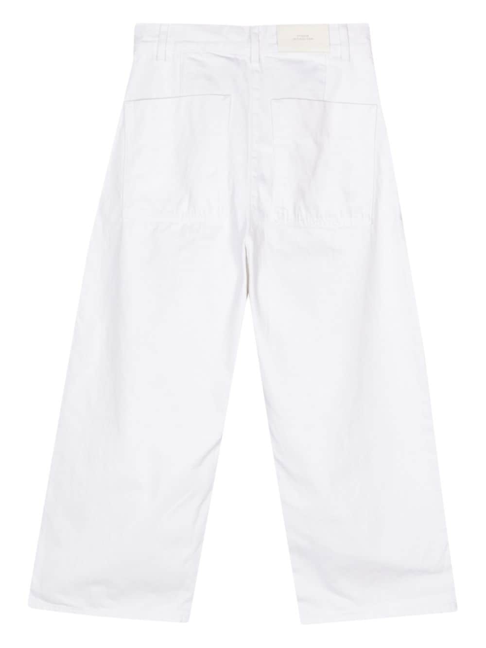 Studio Nicholson Jeans met wijde pijpen - Wit