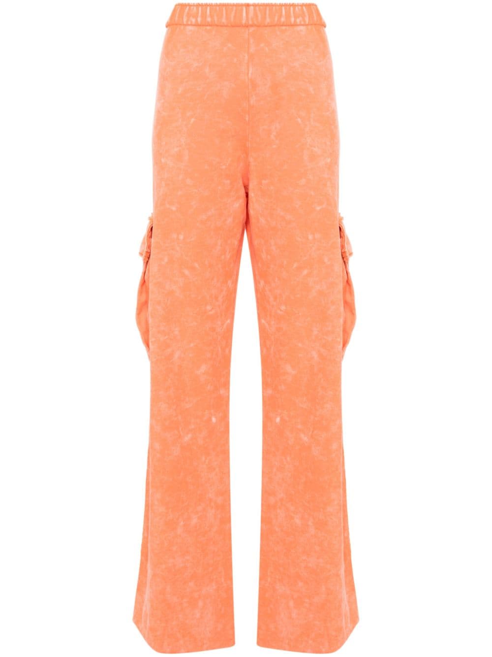 Stine Goya Bleached-effect Jersey Trousers In Orange
