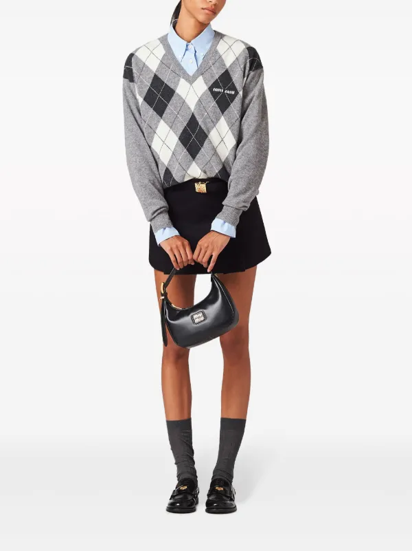 Miu Miu logo-plaque Wool Miniskirt | Black | FARFETCH