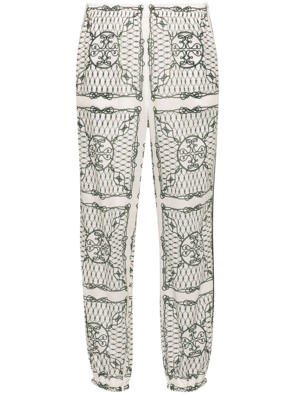 Shop Tory Burch Knot-print Tapered-leg Trousers In White