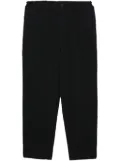 Black Comme Des Garçons cropped elasticated trousers