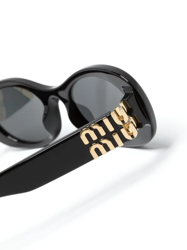 Miu Miu Eyewear Miu Glimpse oval frame Sunglasses Black FARFETCH CA