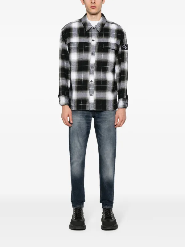 Calvin Klein Jeans mid-rise tapered-leg Jeans | Blue | FARFETCH