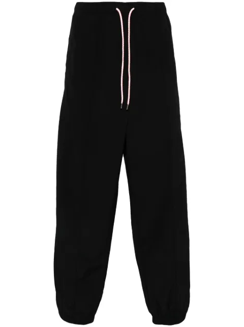 Marcelo Burlon County of Milan pants con motivo de cruz