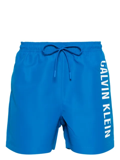 Calvin Klein shorts de playa con logo estampado