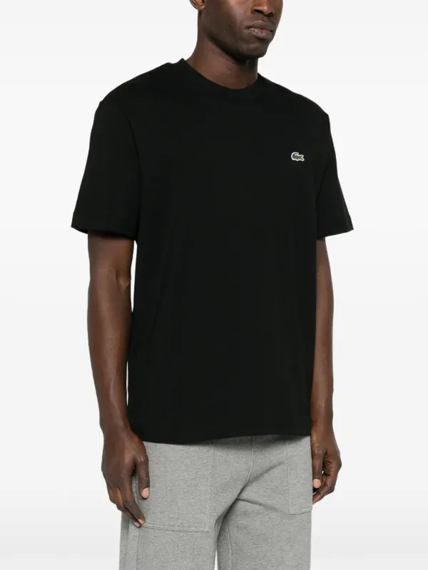 Lacoste Tape ロゴ ブラック Tシャツ Lacoste Logo Tape Jersey T-shirt in Black | MYER