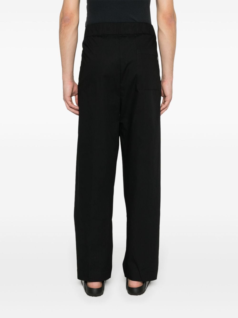 Shop Laneus Tapered Drop-crotch Trousers In Black