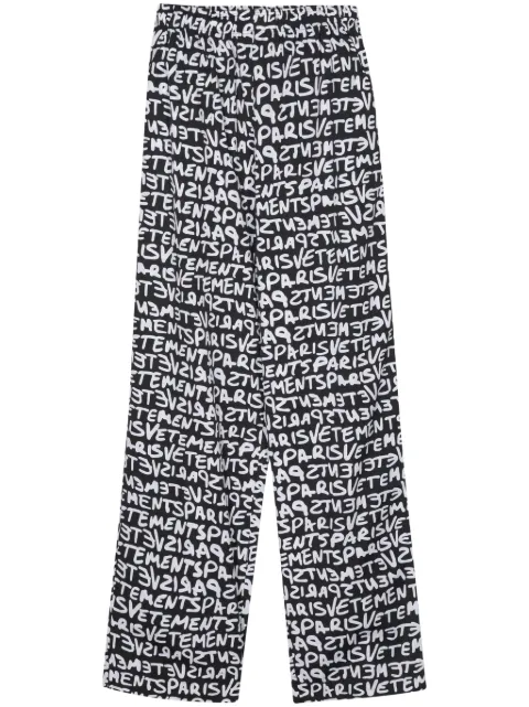 VETEMENTS pantalones rectos con logo estampado