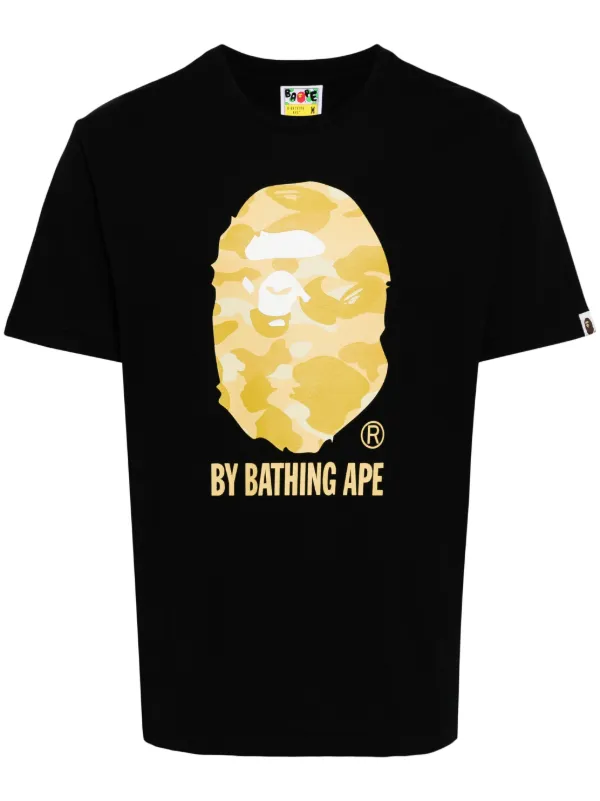 Black and gold bape shirt on sale