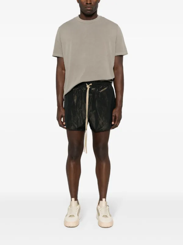 Fear Of God logo-patch Lamé Running Shorts | Black | FARFETCH