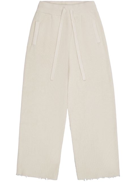 Laneus frayed knitted cotton trousers