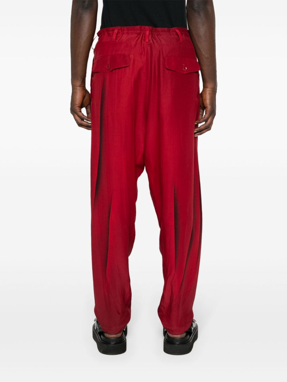 Shop Yohji Yamamoto Abstract-print Silk Trousers In Red