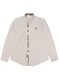 AAPE BY *A BATHING APE® Moonface-embroidered cotton shirt - Neutrals