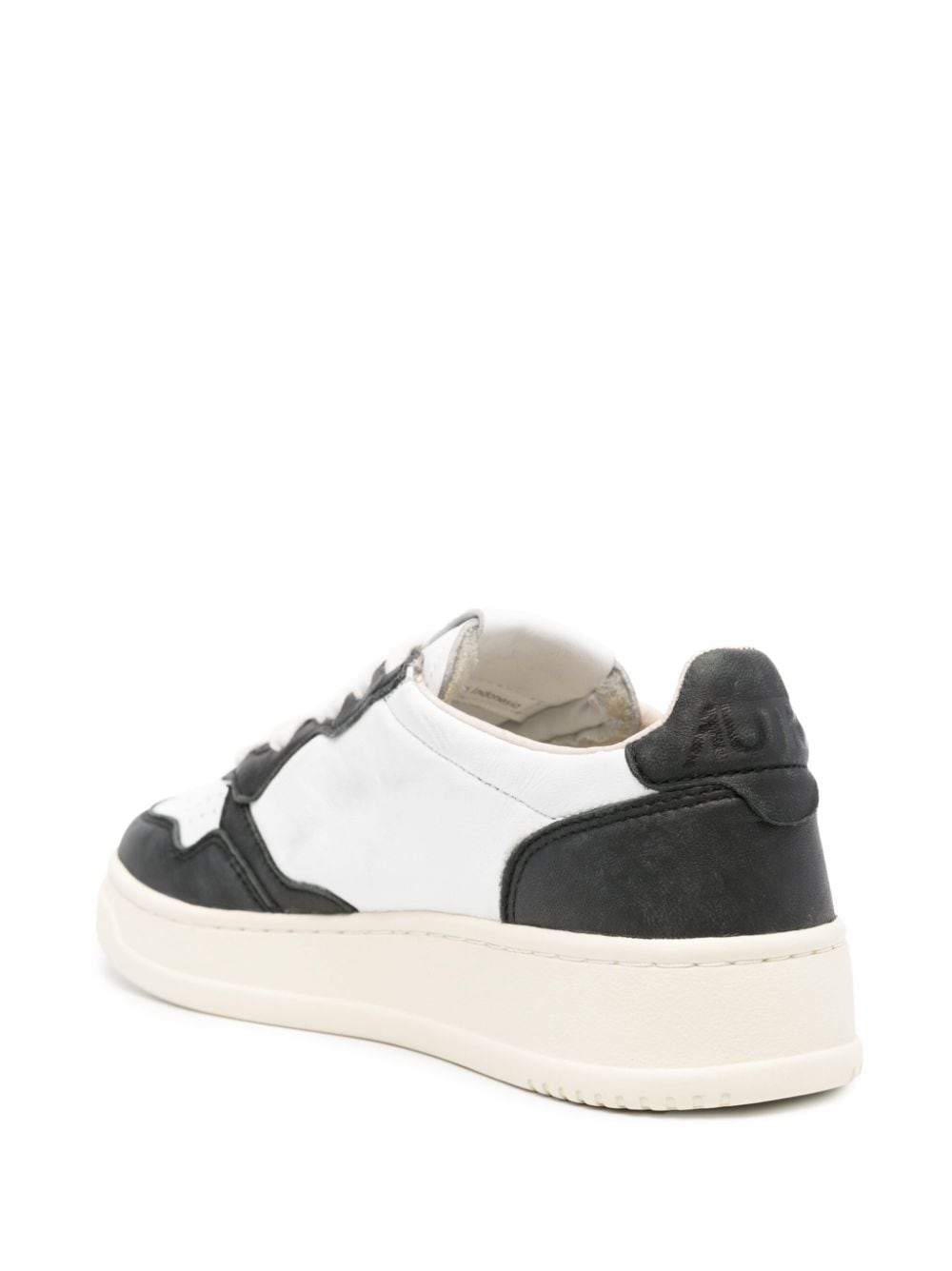 Shop Autry Logo-patch Leather Sneakers In Black