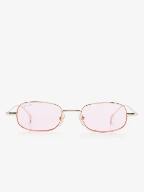 Gucci Eyewear Ovale Sonnenbrille mit Logo-Gravur