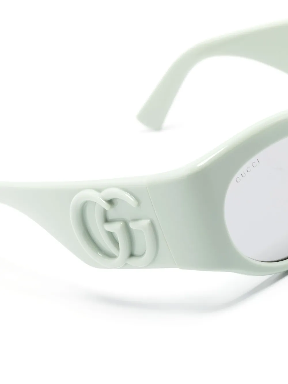 Gucci Eyewear Zonnebril met ovalen montuur Groen