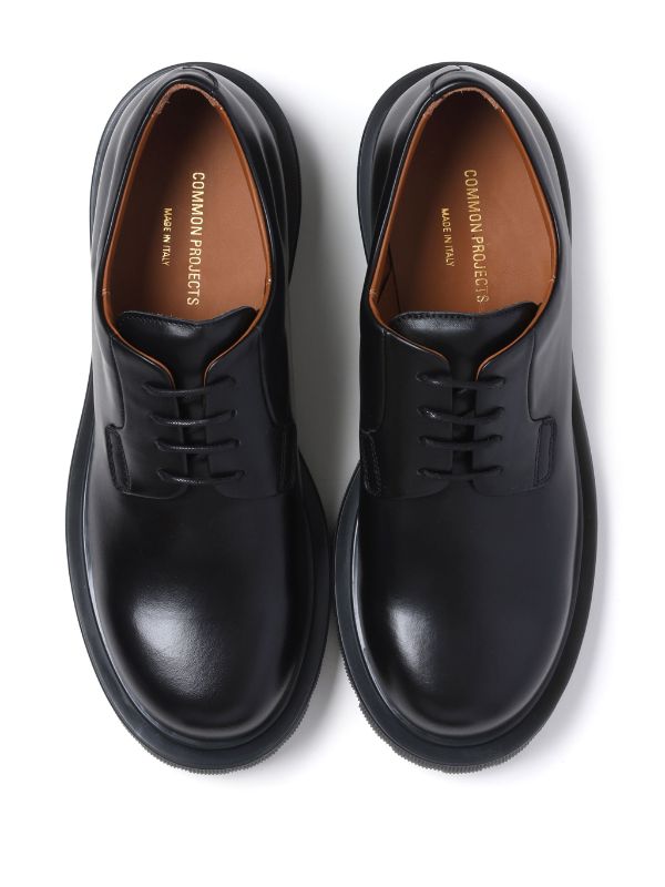 Common Projects Raised Sole Lace Up Leather Derby Shoes, $525, MATCHESFASHION.COM