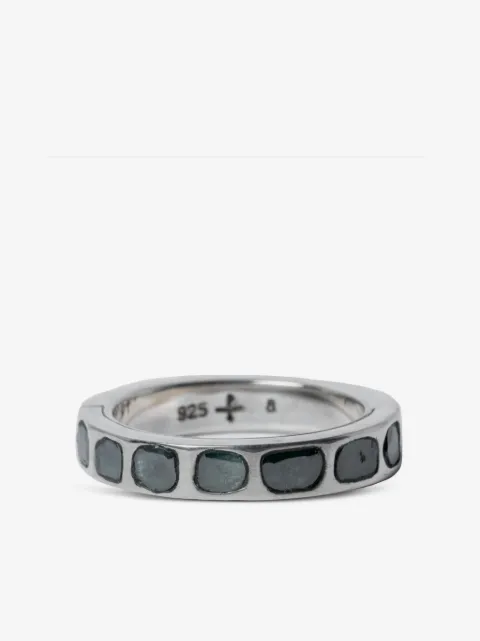 Parts of Four Sistema blue-diamond ring