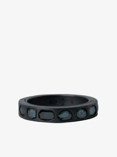 Parts of Four Sistema blue-diamond ring
