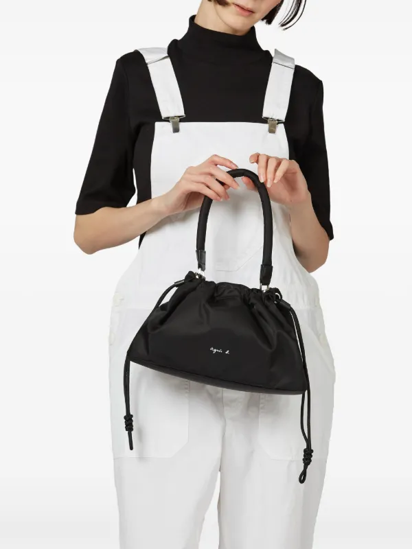 Agnès b. logo-print Drawstring Crossbody Bag | Black | FARFETCH