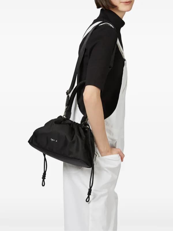 Agnès b. logo-print Drawstring Crossbody Bag | Black | FARFETCH