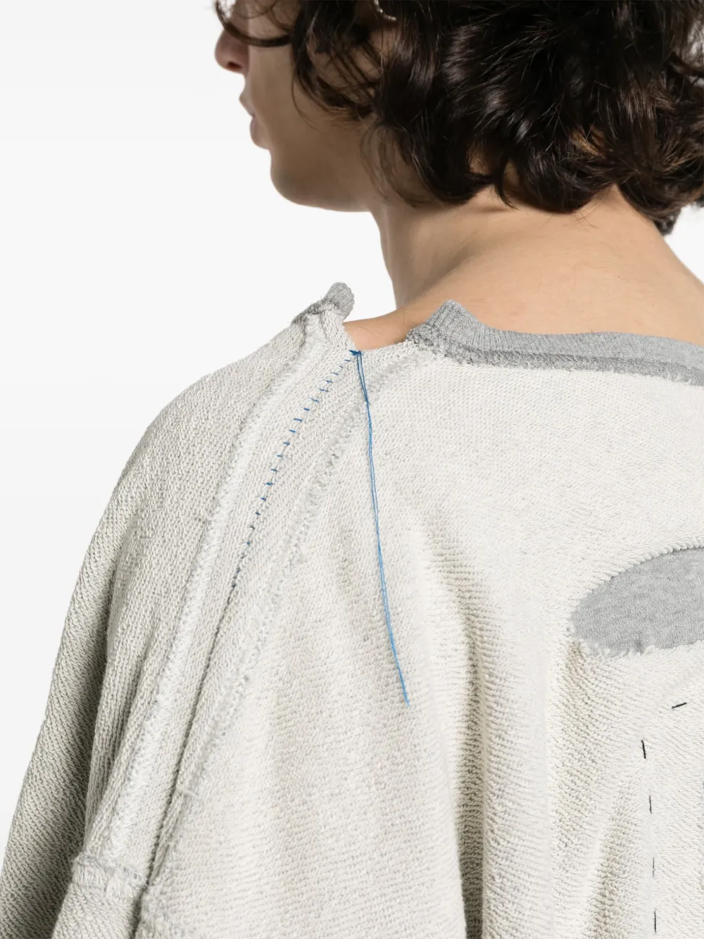 ripped inside-out sweatshirt