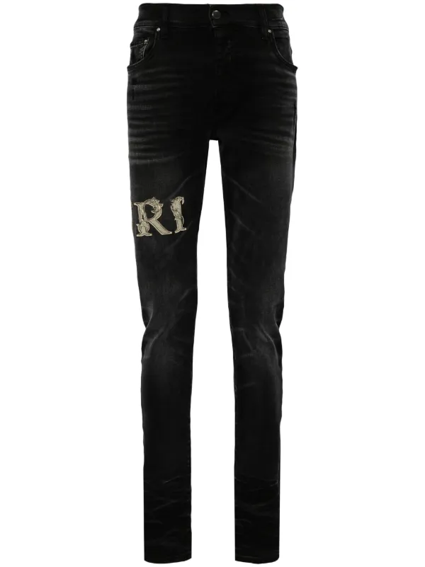 AMIRI Calça Jeans Skinny Com Logo | Preto | FARFETCH BR