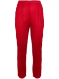 Pleats Please Issey Miyake plissé-effect cropped trousers - Red