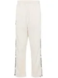 AAPE BY *A BATHING APE® logo-embroidered track pants - Neutrals
