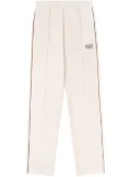 Sporty & Rich Action logo-print track pants - Neutrals