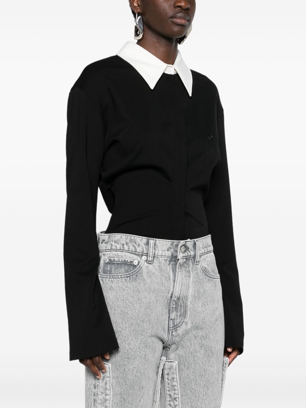Shop Courrèges Spread-collar Buttoned Jumpsuit In Black