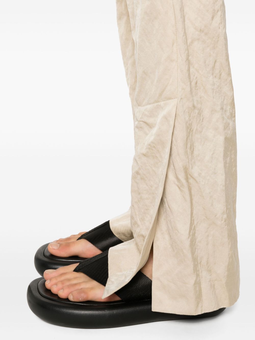Shop Gauchère Creased Tapered Trousers In Neutrals