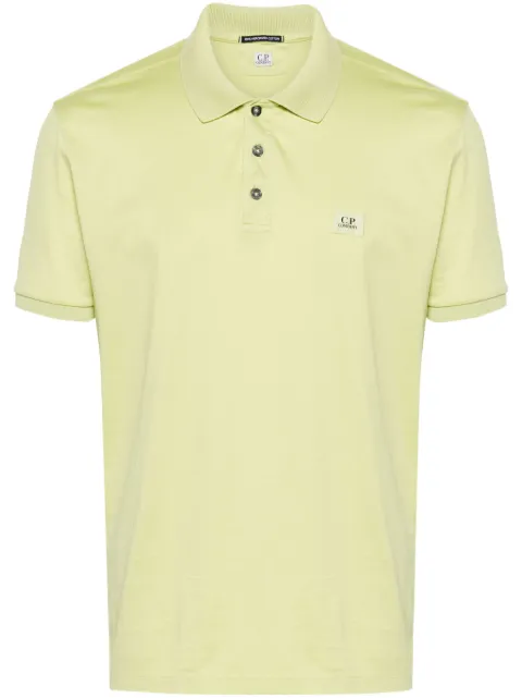C.P. Company playera tipo polo con parche del logo