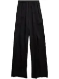 Balenciaga Stencil logo-print satin trousers - Black
