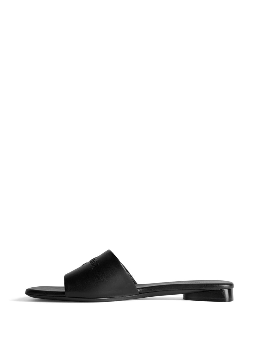 Shop Balenciaga Duty Free Leather Slides In Black