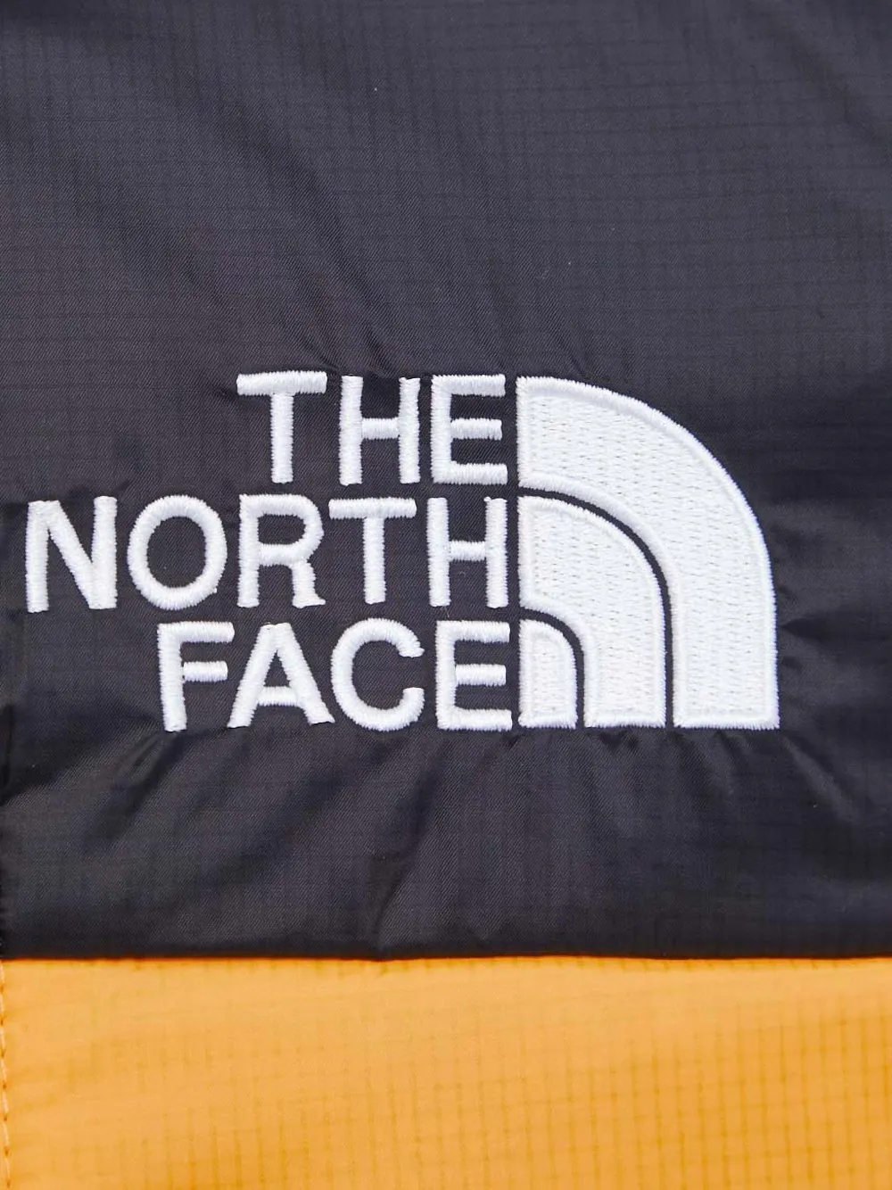 The North Face Jack met capuchon en rits Oranje