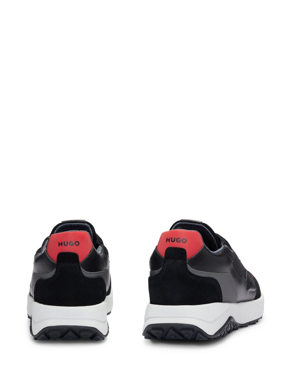 Shop Hugo Logo-debossed Leather Sneakers In Schwarz