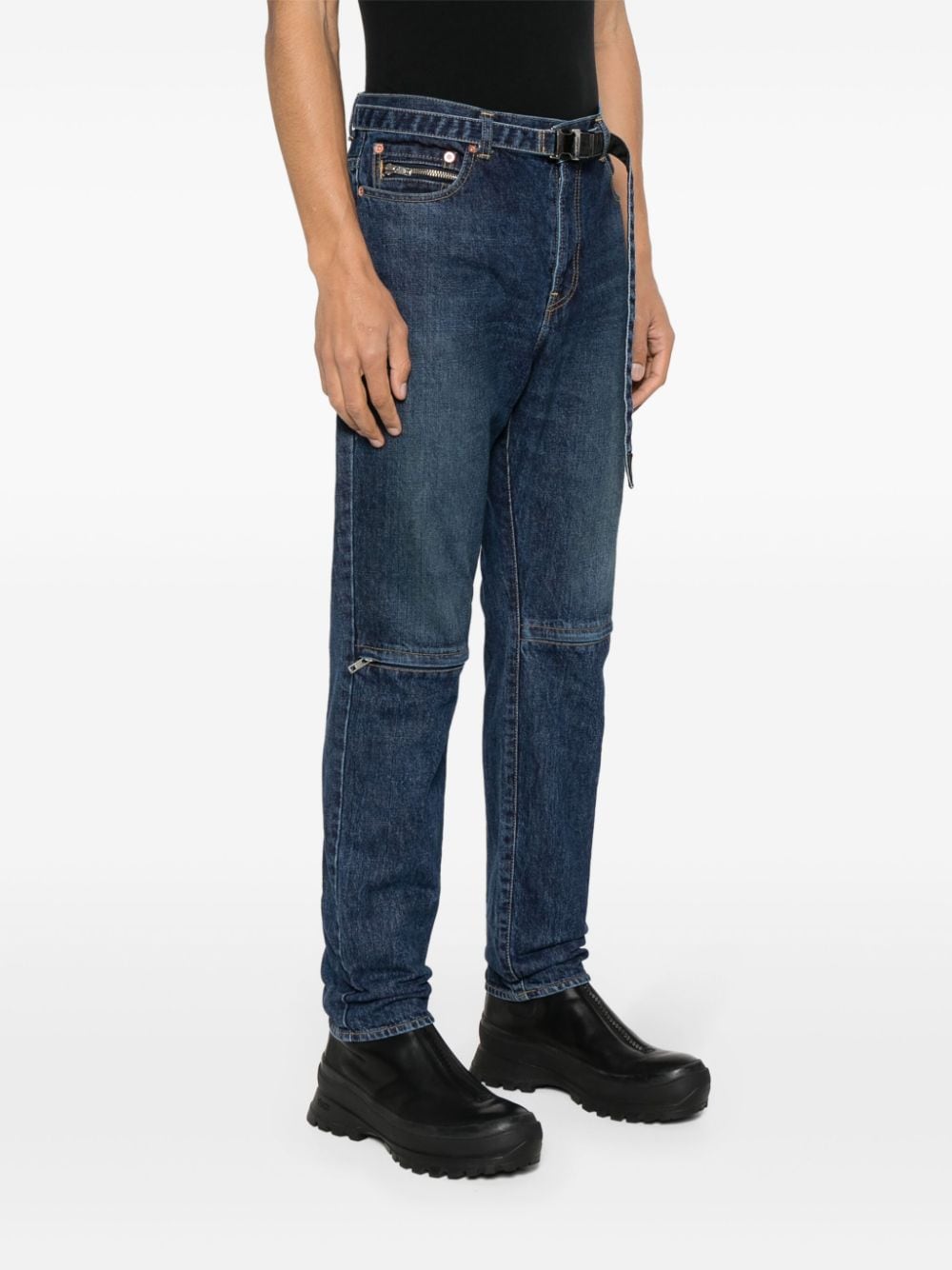 Shop Sacai Belted Tapered Jeans In Blue
