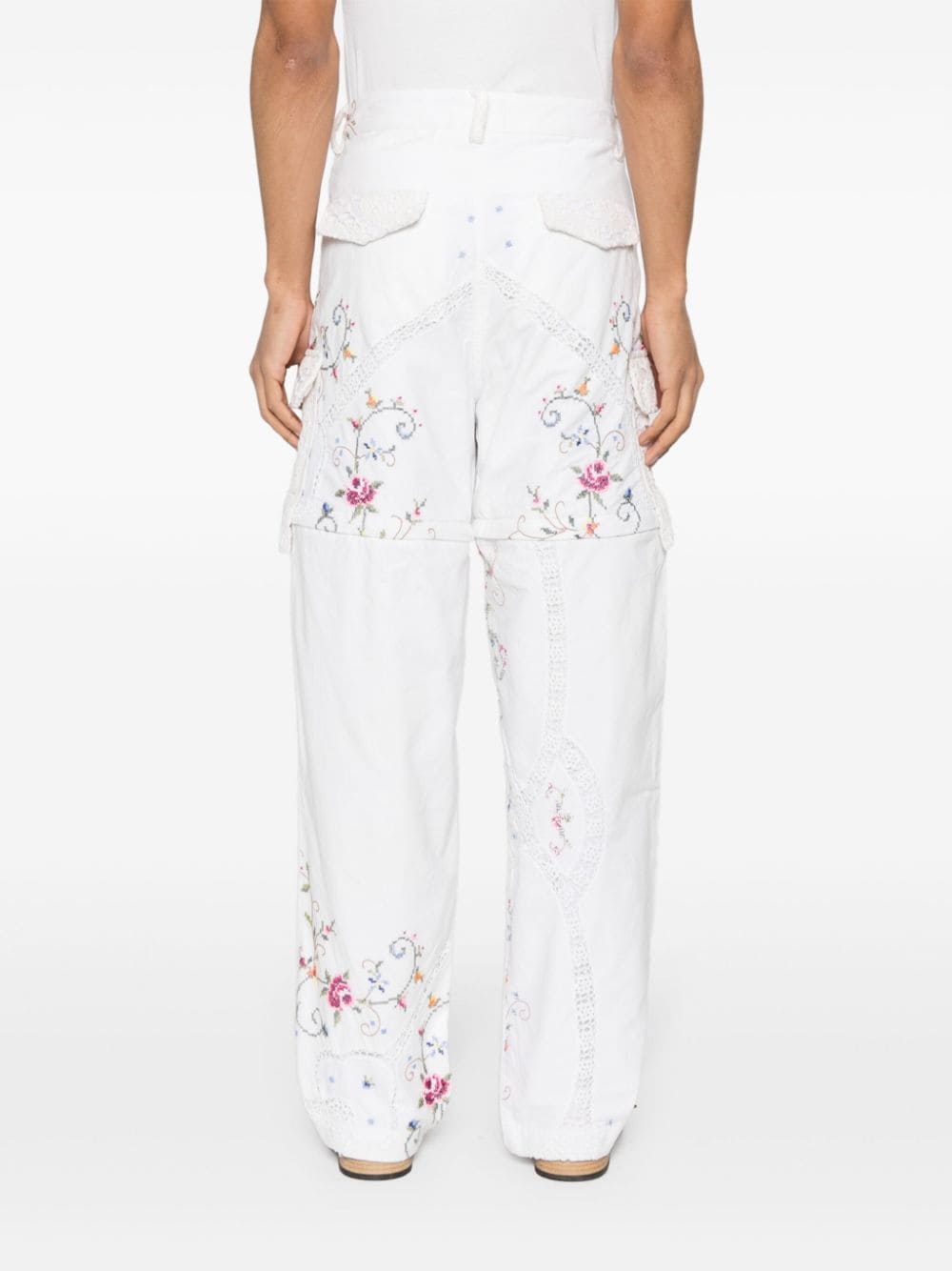 Shop Saints Studio Floral-embroidery Tapered Trousers In Neutrals