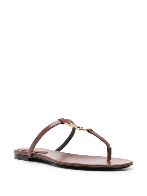 Saint Laurent Cassandra Leather Flip Flops | Brown | FARFETCH