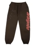 SP5DER Araignee star-print track pants - Brown