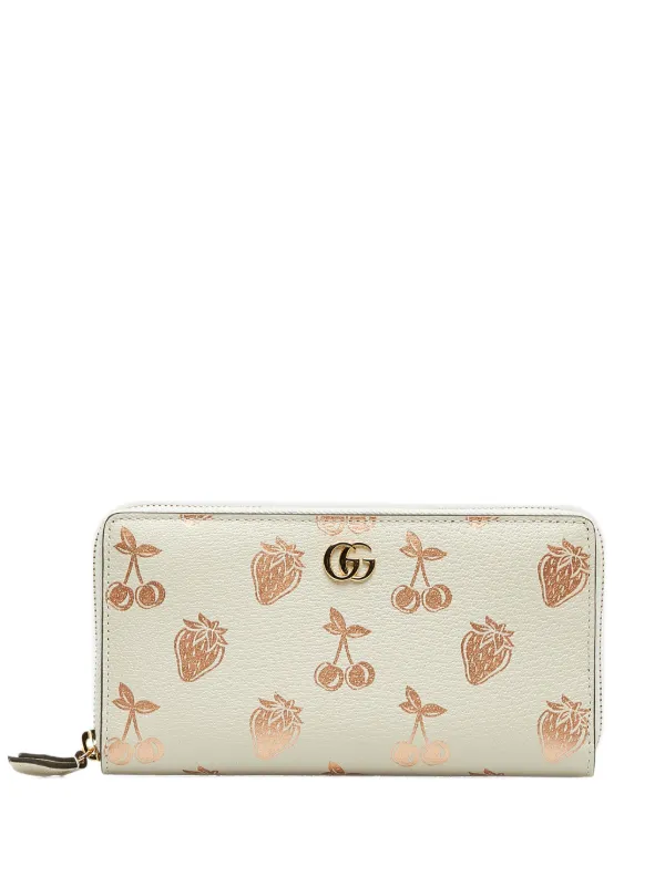 https://www.farfetch.com/ao/shopping/women/gucci-pre-owned-2016-2023-gucci-berry-marmont-leather-wallet-item-23069115.aspx