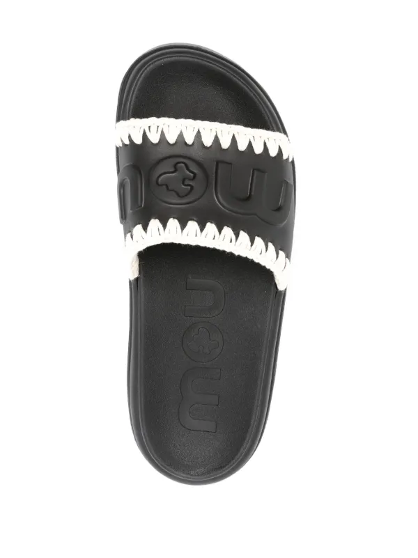 Mou logo-embossed Slides | Black | FARFETCH CA