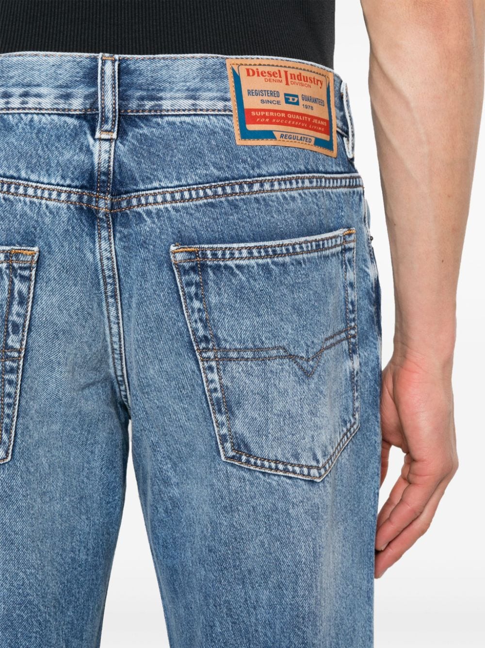 Shop Diesel D-finitive Tapered-leg Jeans In Blue