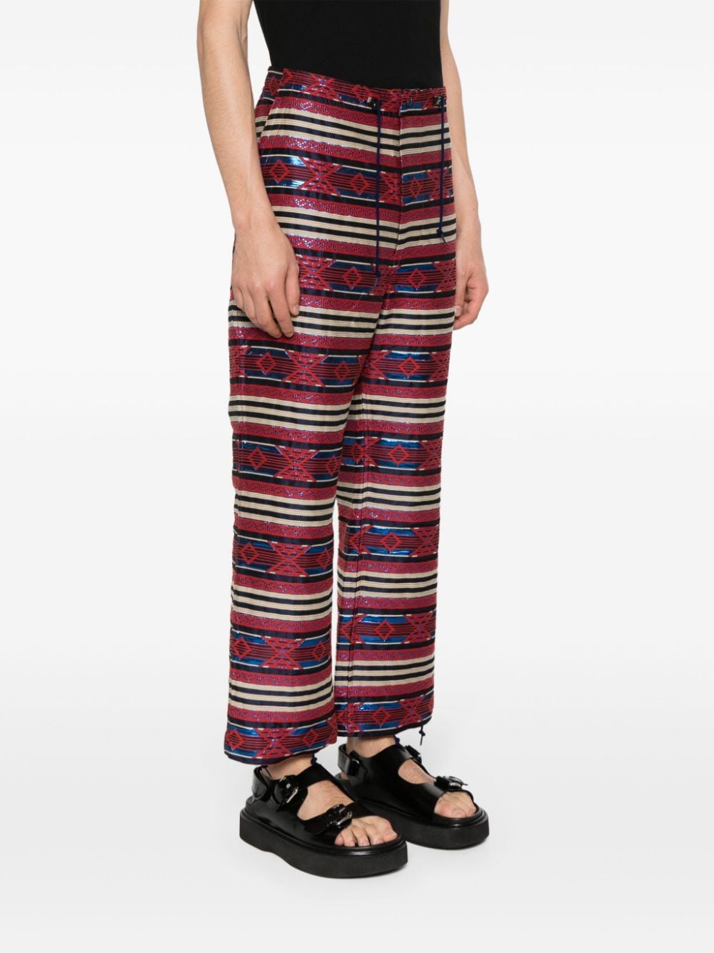 Shop Needles Patterned-jacquard Straight-leg Trousers In Red