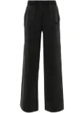 VETEMENTS crystal-embellished track pants - Black