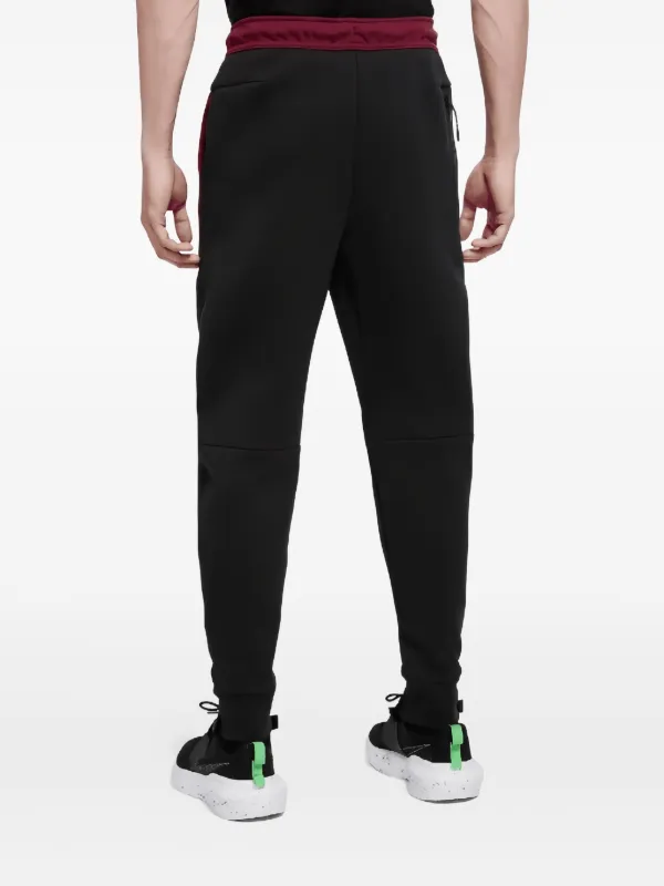 Nike テックフリース トラックパンツ | レッド | FARFETCH JP