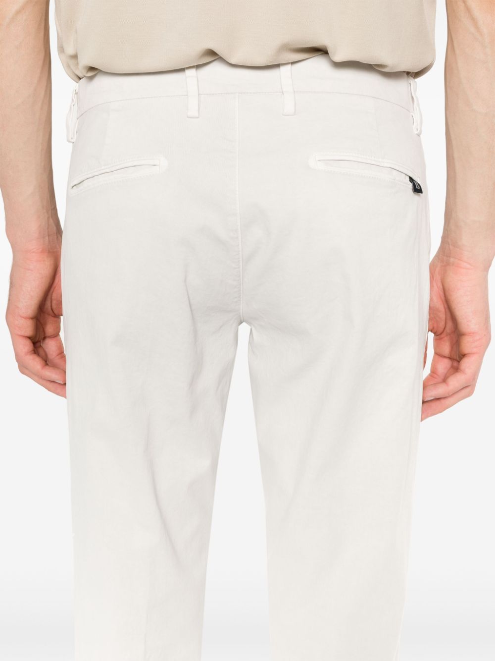 Shop Boggi Milano Logo-embroidered Tapered Trousers In White