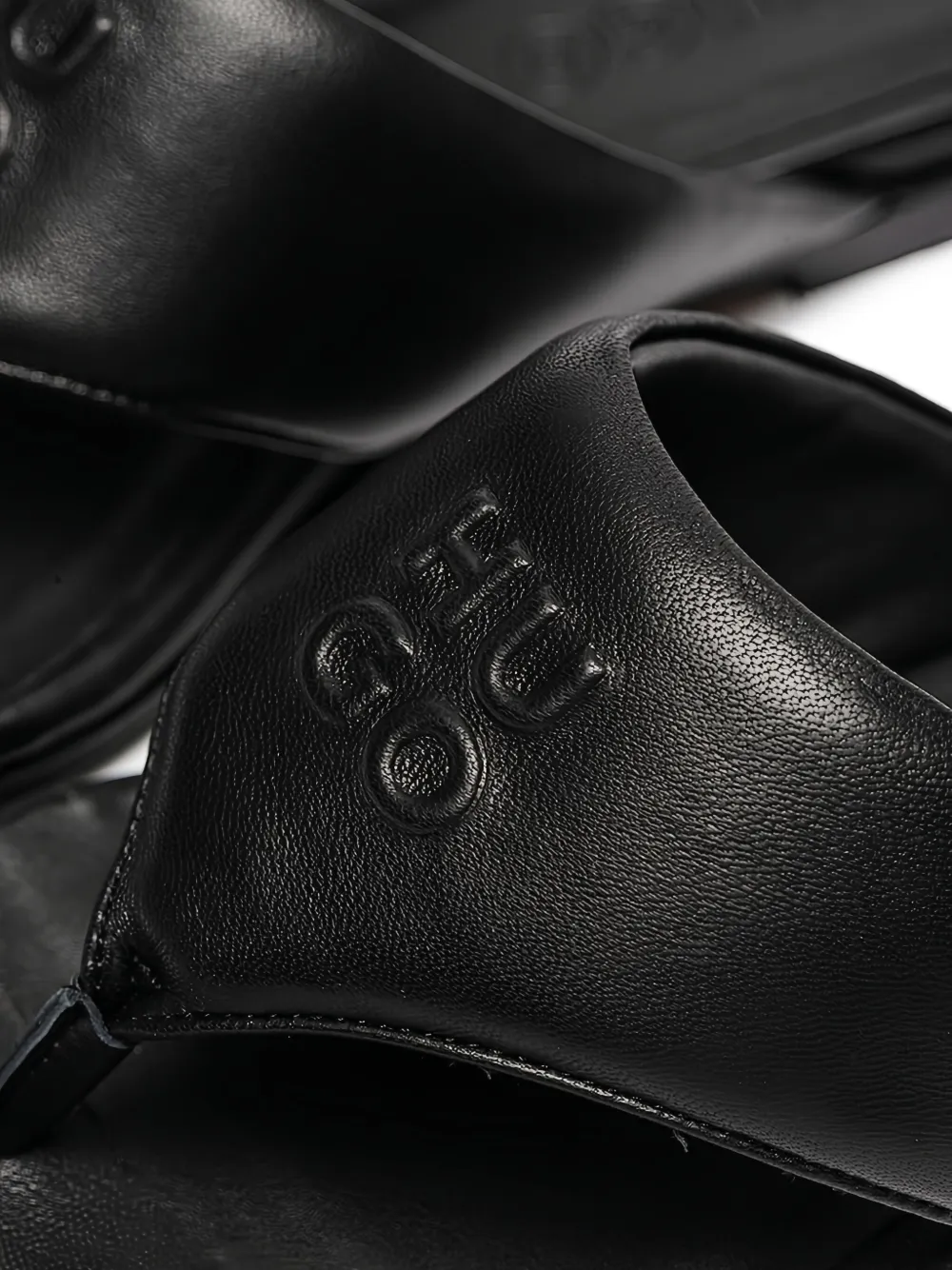 HUGO logo-embossed pointed-toe sandals Black