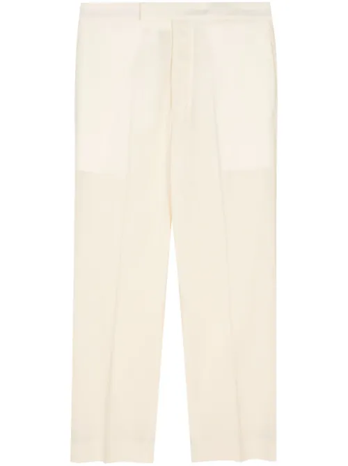 Pantalon fuselé en laine à plis marqués - SAPIO - Modalova